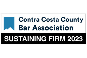 Gavel and Stethoscope on Reflective Wooden Table.